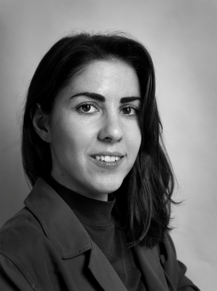 Black and white headshot of Anna Damoli.